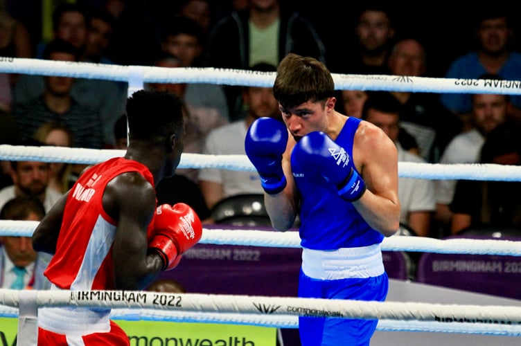 Jamie Devine in action against Ghana’s Abdul Wahib Omar in the men’s over 60kg-63.5kg light welterweight last-32 round. 