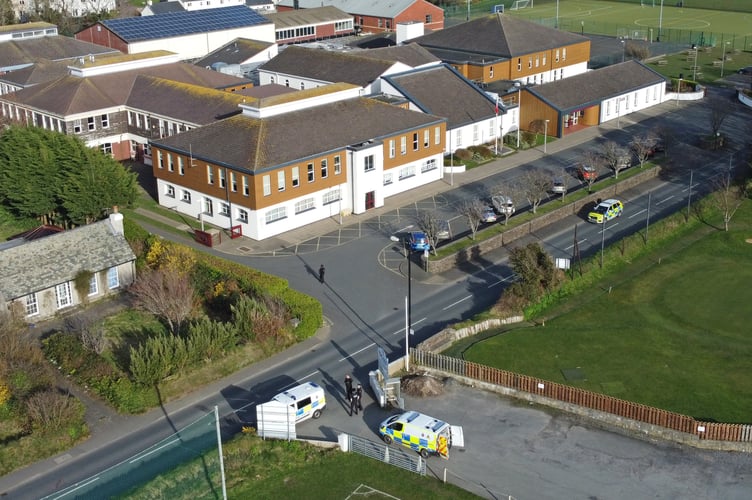 27/3/2023: Police presence outside Queen Elizabeth II High School in Peel. PICTURE BY DAVE KNEEN.