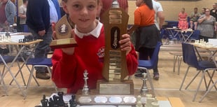 Rosa, 9, wins top chess trophy