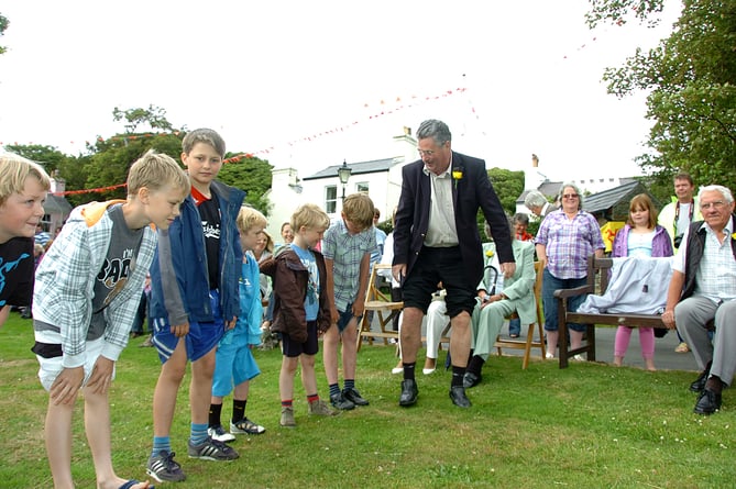 Maughold Parish Day in 2011. Steve Rodan takes part in  the knobbly knees contest