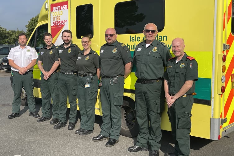 (Left to right): Mark Corlett (IMAS) with Matthew Lane, James Winmill, Georgina Glover, Dewi Lloyd, Pete Jones and Martin Hamm (WAST)