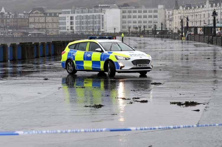 Pictures of the police on Douglas seafront as part of walkway cordoned off