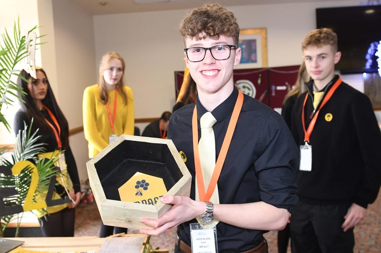 The Impact team created hexagonal planters from recycled wood to attract bees