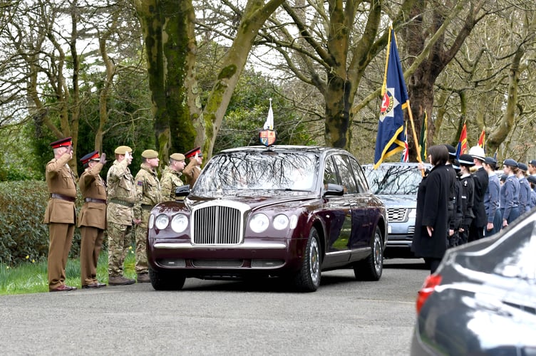 Queen Camilla arrives at Government House