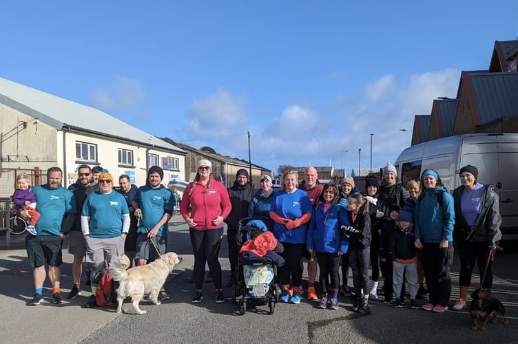 22 friends and family who walked the 21km route from Peel to Douglas on Saturday to raise awareness about down syndrome 