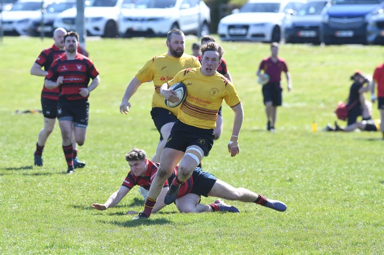 Manx Cup rugby: Douglas (in yellow) v Ramsey (in red)