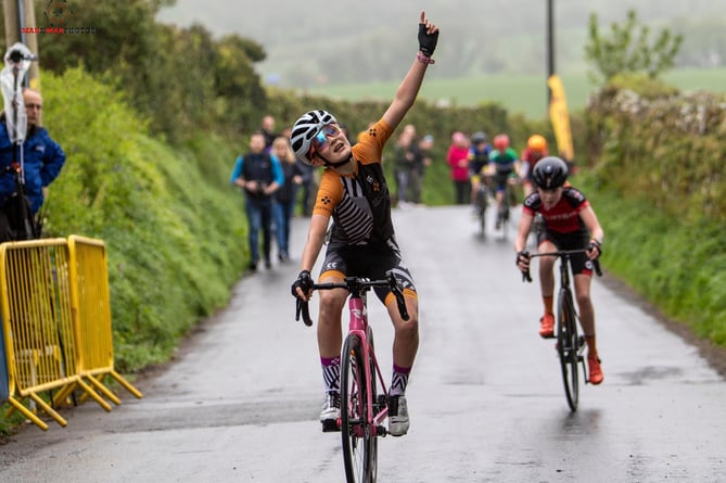 Secret-Training.cc's Olivia Smallshaw celebrates as she crosses the line to claim victory in the youth B girls class. She went on to win that category overall (Photo: Gary Jones)