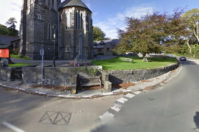 Crews are replacing two service inspection lids on Saddle Road next to Braddan Parish Church