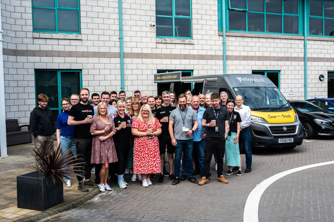 Flutter International staff with the new 'Care for a Drink' coffee van that is raising money for Hospice