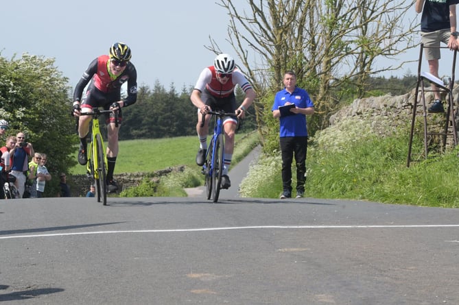 Corrin Leeming (left) sprints clear of Maxwell Hereward of 360 Cycling to clinch victory in the final round of the Proper Northern road race series in Aughton near Carnforth in Lancashire