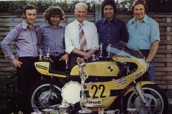 Phil Carpenter with his team. In 20 TT rides, he only finished four races