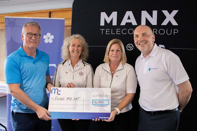 (Left to right) Gary Lamb, chief executive at Manx Telcom, Gemma Wild and Jane Holt from the Forget Me Not charity plus Scott Bradley, head of corporate sales at Manx Telecom