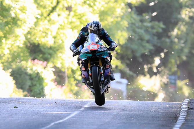 Michael Dunlop powers his Honda Fireblade over the Milntown jump during Monday evening's opening qualifying session of TT 2024