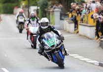 Woman arrested for walking on road shut for Isle of Man TT races 'lost track of time'