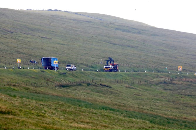 The car being recovered on the Mountain Road after the crash