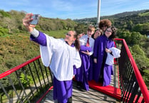 Video shows choir singing at the top of iconic Laxey Wheel