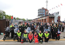 Pictures as hundreds of Isle of Man TT fans escorted on lap of course