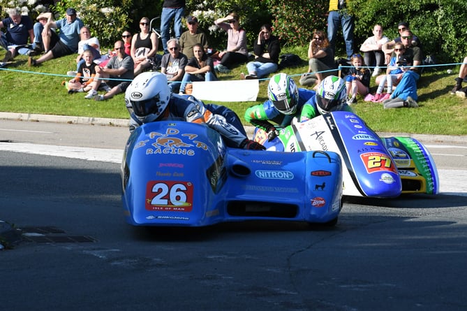 Action at Governors Bridge in Sidecar Race 1