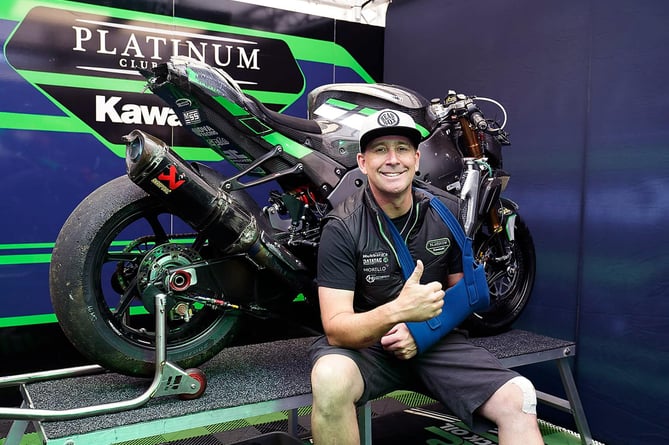 Australian Davo Johnson in the Platinum Club Kawasaki awning following his Superbike crash