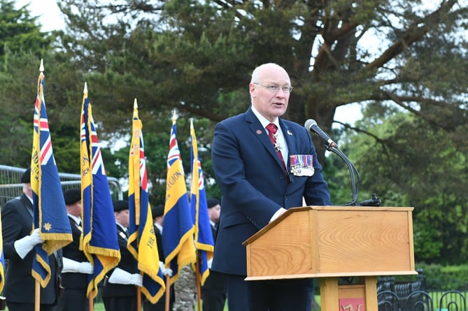 Lieutenant Governor Sir John Lorimer speaking at the lighting of the beacon