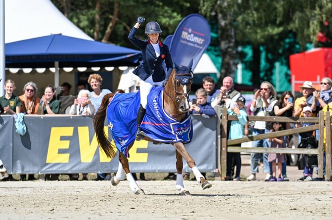 Yasmin Ingham celebrates winning the CCI4*S competition at the Longines Luhmühlen Horse Trials in Germany recently, a result which helped her to be selected for this summer's Olympic Games in Paris (Photo: Peter Nixon)