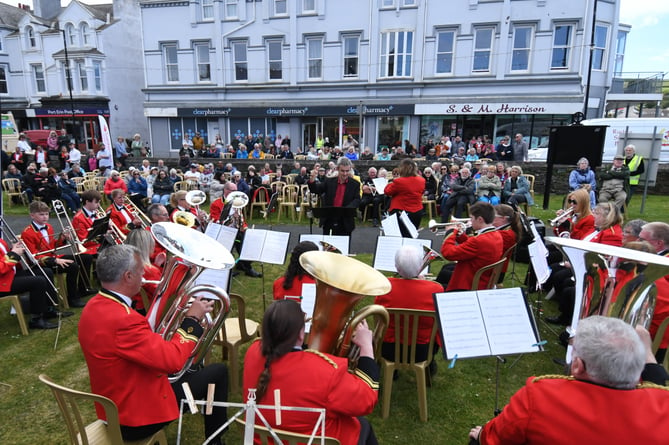 Crowds gather to listen to Ramsey Town Band playing at the 2024 Port Erin Brass Band Festival