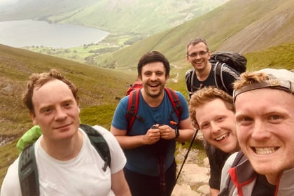 Friends abandon 24-hour charity challenge to save walker on mountain 
