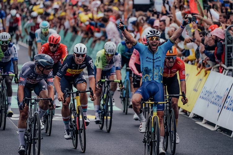 Mark Cavendish celebrates as he crosses the finish line in Saint Vulbas to claim an historic 35th stage victory at the Tour de France on Wednesday afternoon. The Manx Missile's latest win puts him one clear of the legendary Eddy Merckx and cements his position as the greatest sprinter in the history of the sport (Photo: Zac Williams/SWpix.com)