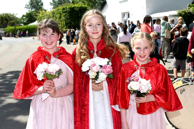 Festival princess Lara Moore (centre) with attendants Sophie Pirson (left) and April Wiles (right)