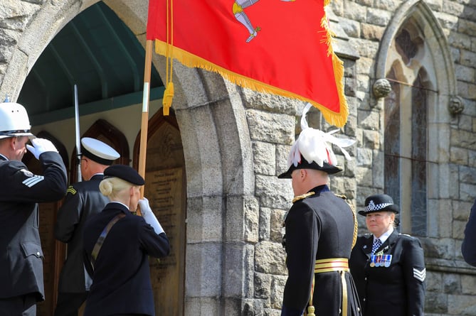 Lieutenant Governor Sir John Lorimer entering the Royal chapel