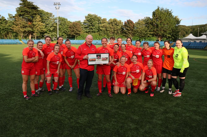 Prior to the IoM women’s game on Friday evening, the Isle of Man Football Association recognised the achievements of Eleanor Gawne after she became the first Manx women’s footballer to reach 50 island appearances. IoMFA president Tony Mepham gave a quick speech before vice-president Shaun Gritton presented a photo frame which included team pictures of Ellie earning her first cap (Celt Cup 2000) and her winning the bronze medal at 2023 Guernsey Island Games (Photo: Paul Hatton)