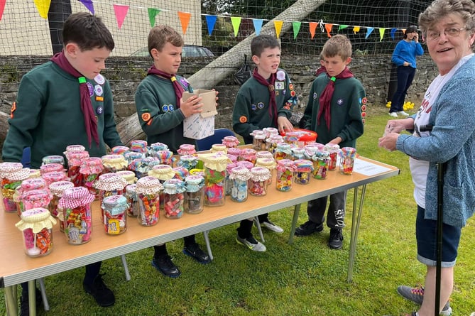 Members of 1st Marown Scouts Group worked hard on their sweet stall