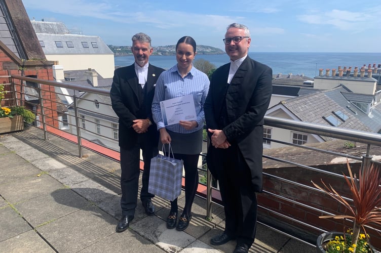 Outstanding participant award recipient Alexandra Cowley with the President of Tynwald, Laurence Skelly MLC (left) and the Speaker of the House of Keys, Juan Watterson SHK