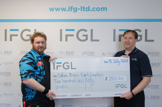 Callum Brew (left) receives his sponsorship cheque from IFGL's Neil Brew