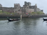 Video shows competitors brave the weather at Viking Longboat Day