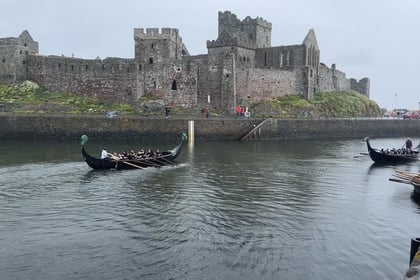 Video shows competitors brave the weather at Viking Longboat Day