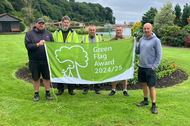 The parks team from Ramsey Town Commissioners with the Green Flag which will be displayed in the Mooragh Park.