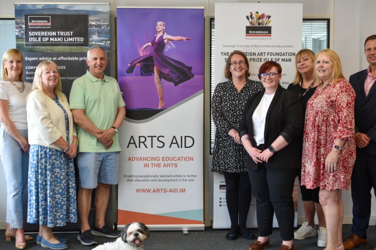 Representatives from the Sovereign Arts Foundation (left) and Arts Aid (right)