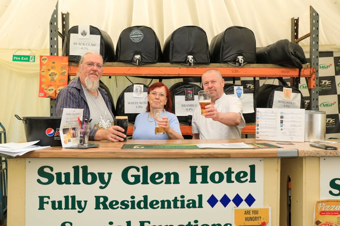 Paul Summers, Rosie Christian & Jonathan Riley at the 19th annual Sulby Glen Pub Beer, Cider & Gin Festival last year. 