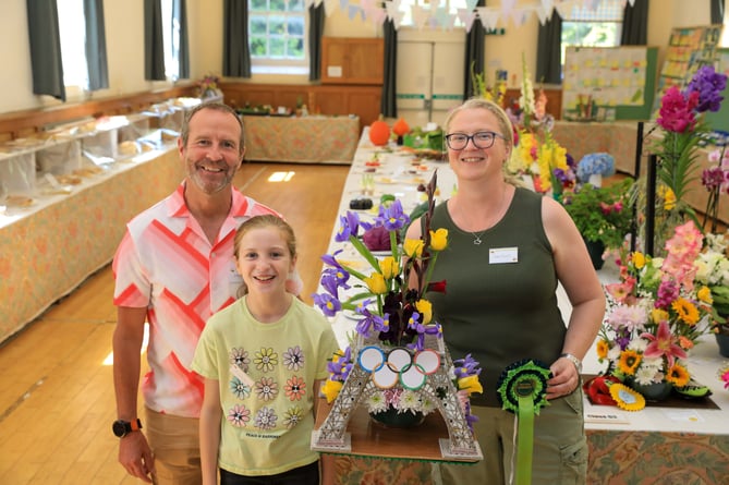 Martin, Kenzie & Mary Phillips, section winner for Floral Art at the Sulby Horticultural Show