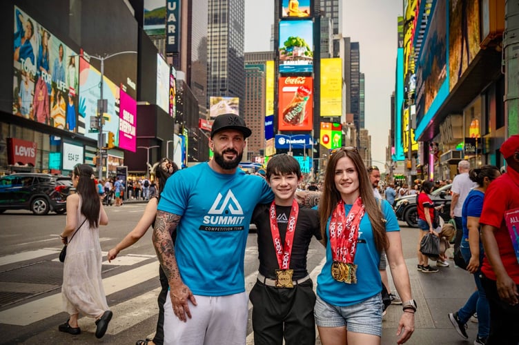 (Left to right) Summit Grappling head coach Conrad Roberts, Alan Greenhalgh and Hayley Curtis in Times Square after the IBJJF New York Jiu-Jitsu Open 