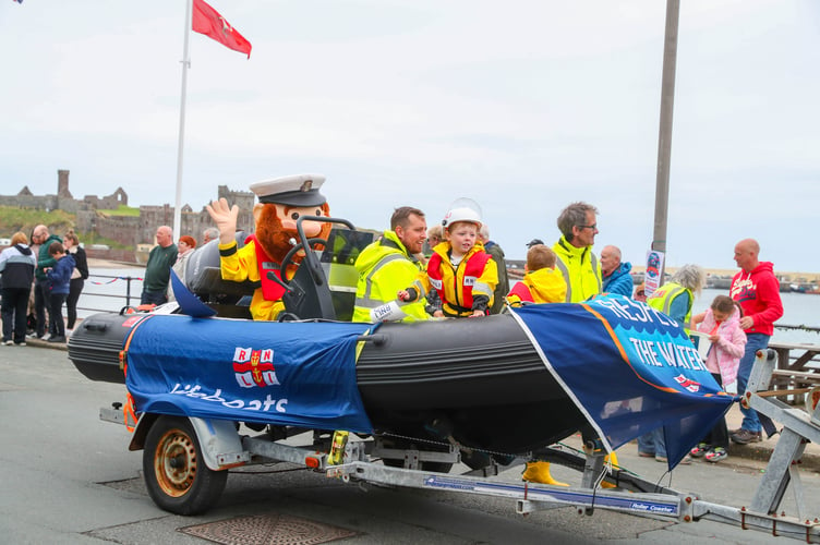 Peel's RNLI lifeboat crew enjoyed themselves, waving to crowds