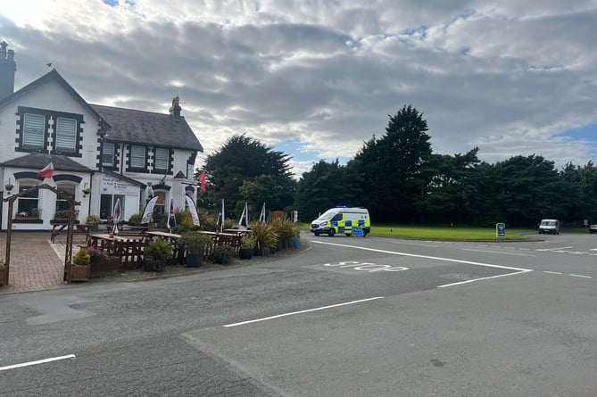 Police at the scene of the crash near Tynwald Hill