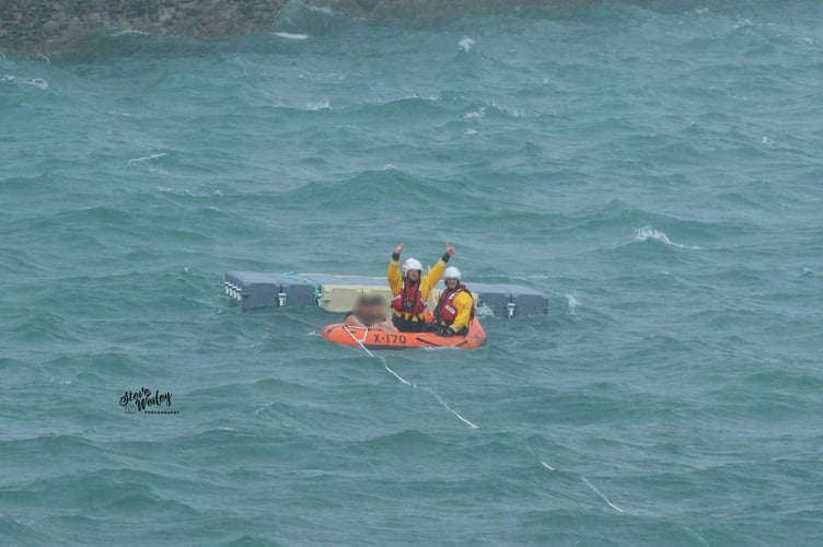 The two individuals were rescued in Ramsey Bay on Monday afternoon