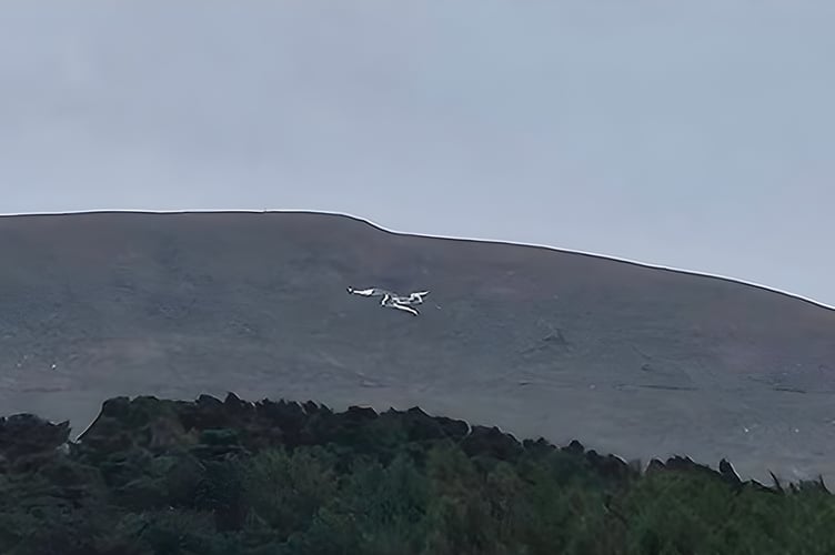 The three legs on North Barrule has been repainted white