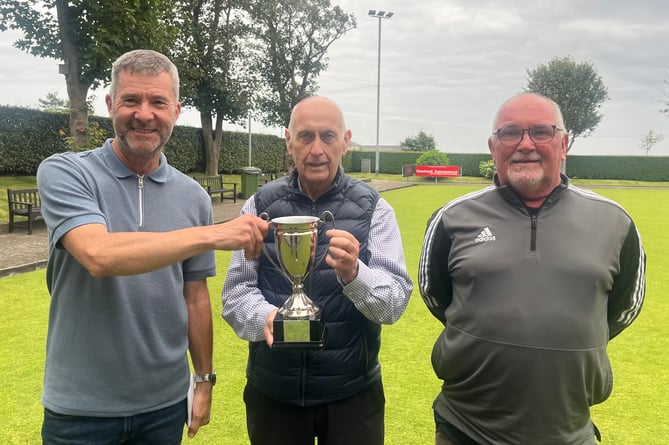 Onchan Commissioners Cup winners Kevin Quirk (left) and Steve Parker (right) with Derek Crellin of Onchan Commissioners (Photo: Glynn Hargraves) 