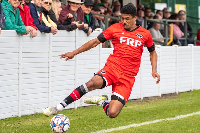 Ravens attacker Adam Adebiyi lunges to keep the ball in play against Charnock Richard (Photo: Steven Taylor/SJT Photos)