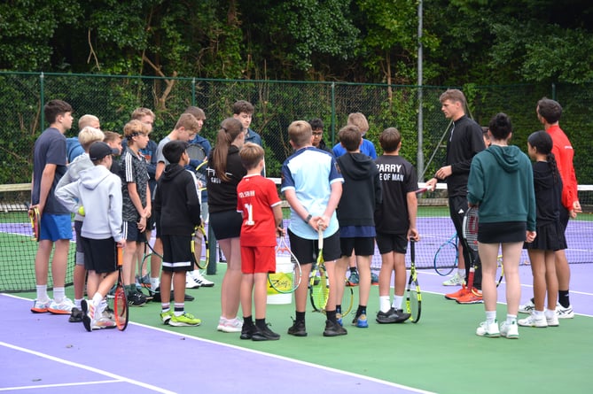 Isle of Man tennis star Billy Harris with Albany LTC junior members at Ballaughton Meadows (Photo: Andy Dalrymple)