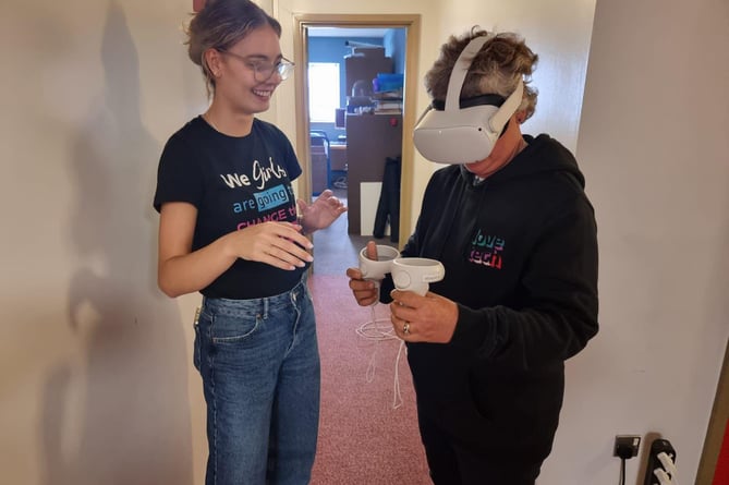 Lady Lorimer trying the VR headset together with Love Tech committee member, Alex Halsall. 