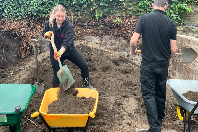 PlayItForward scheme and Manx Wildlife Trust volunteers working at the site of the new community garden at Government House